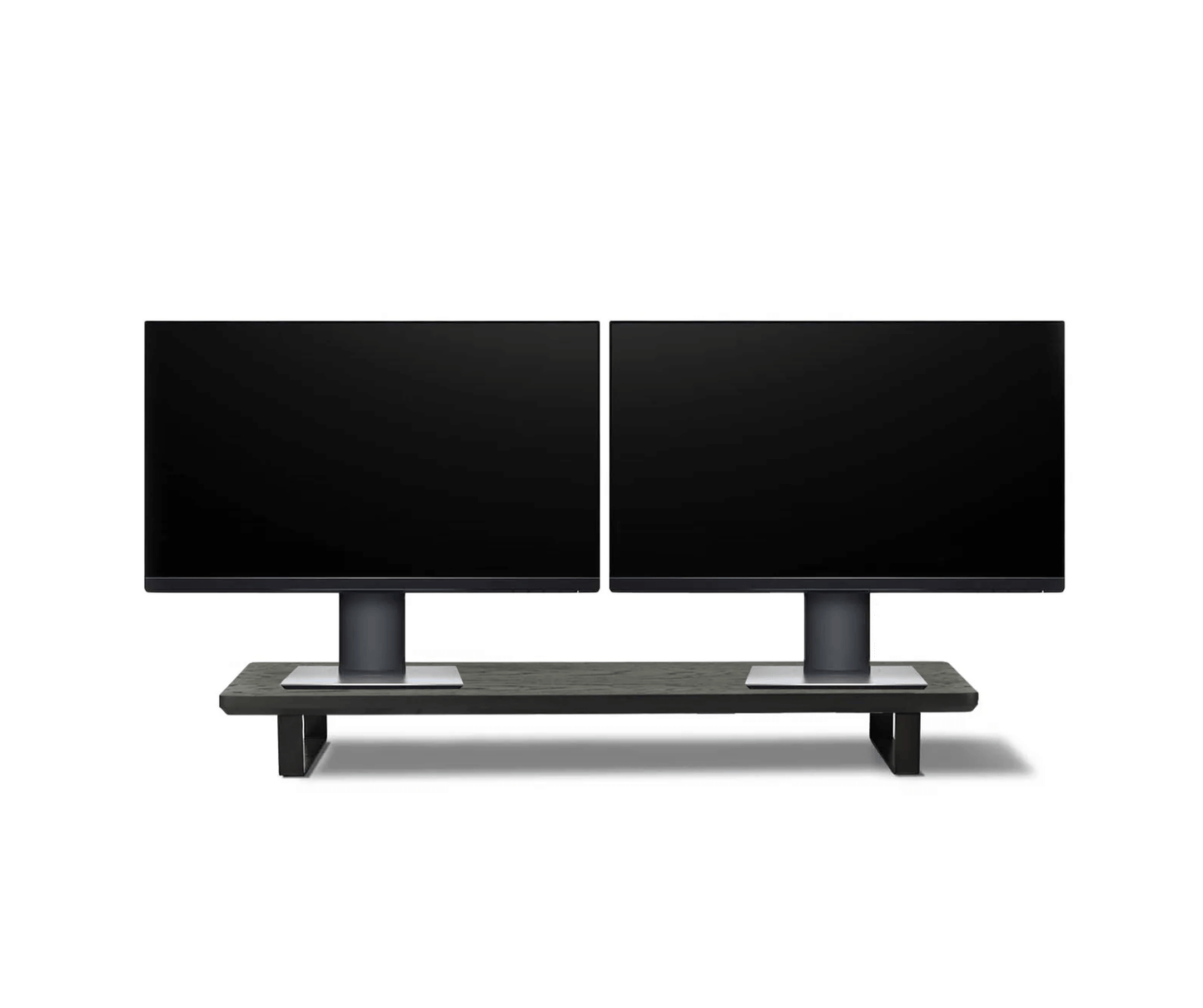 Black Wooden Desktop riser with two wide screen monitors place on top