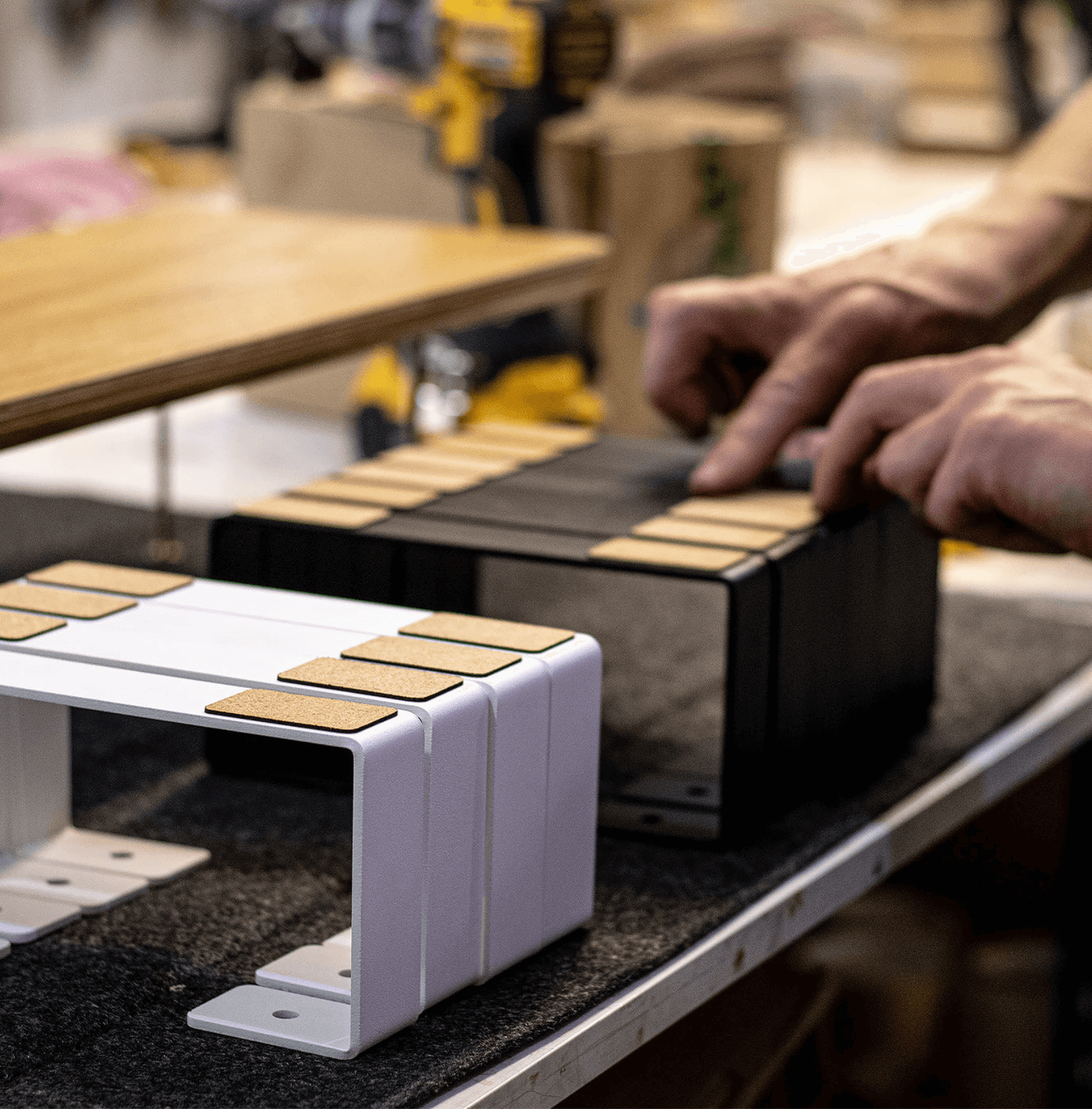 Iron legs for Kansoki Monitor stand being arrange by kansoki employee