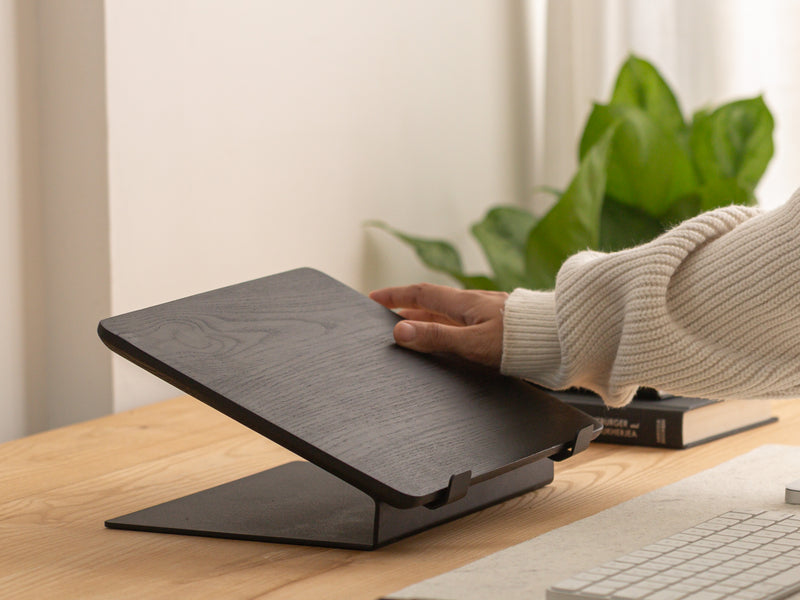 Black Ash | All Metal | wooden laptop stand – side hero shot on white background with laptop