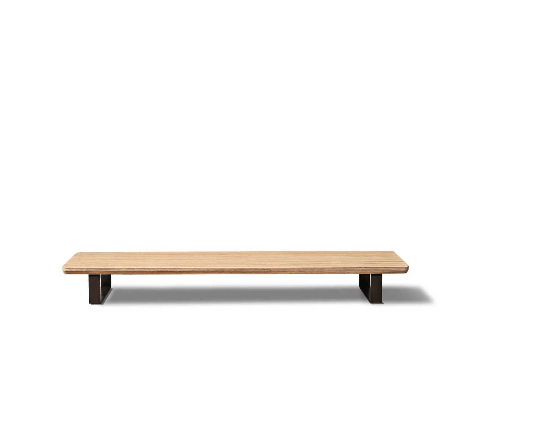 wooden monitor stand with black metal legs, isolated on white background and made of Ashwood