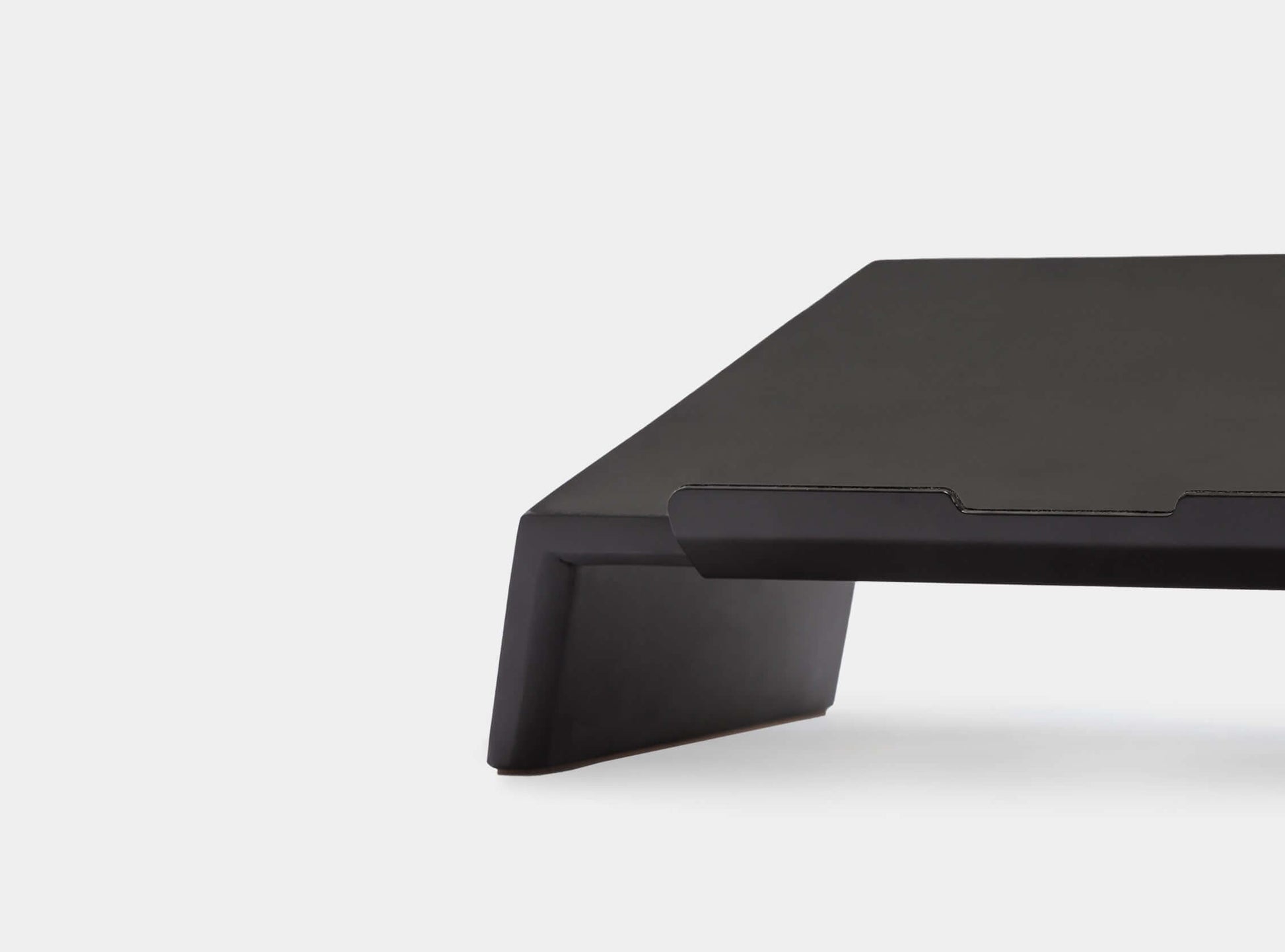 Black | wooden laptop stand – close‑up of matte black scratch‑resistant coating
